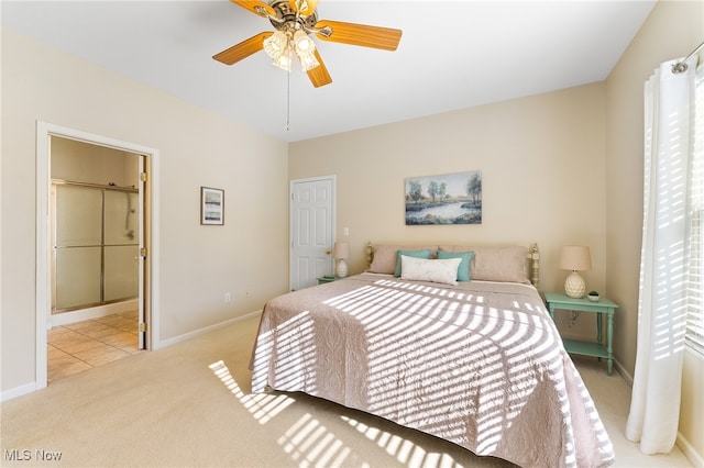 bedroom with light carpet, multiple windows, and ceiling fan