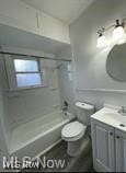 full bathroom with vanity, toilet, and shower / tub combination