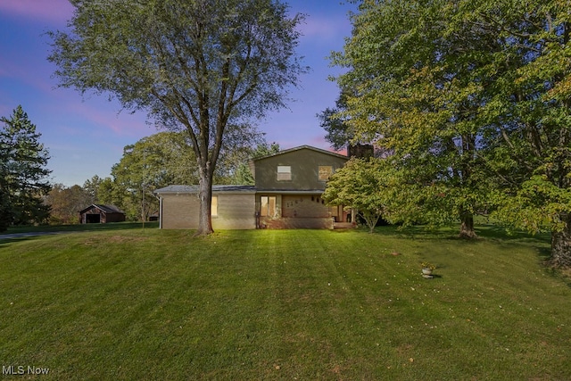 exterior space featuring a lawn