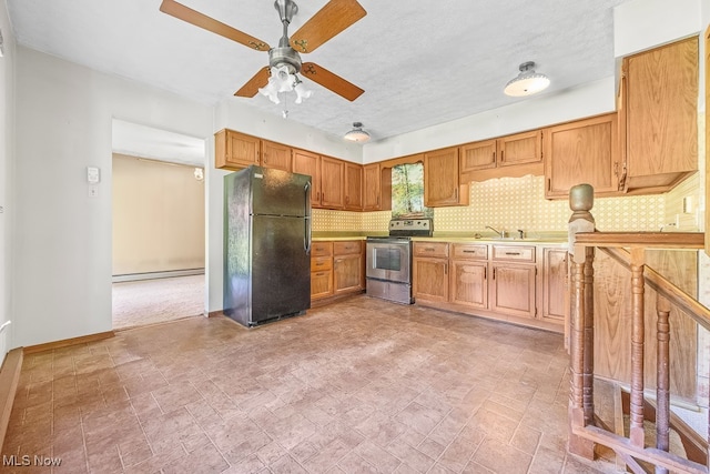 kitchen featuring black refrigerator, ceiling fan, tasteful backsplash, and electric stove