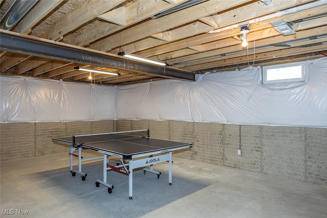 recreation room with concrete floors