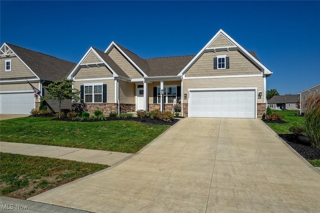 craftsman-style home with a porch, a front lawn, and a garage