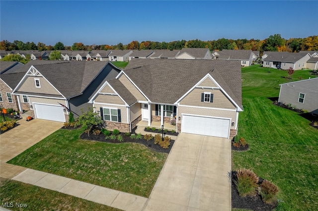 craftsman-style house featuring a front yard