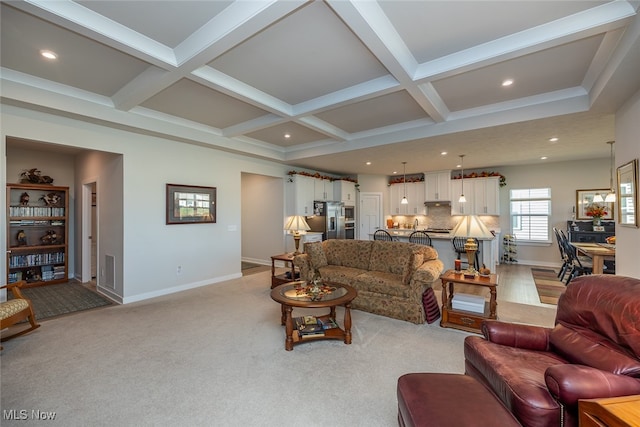 carpeted living room featuring beamed ceiling and coffered ceiling