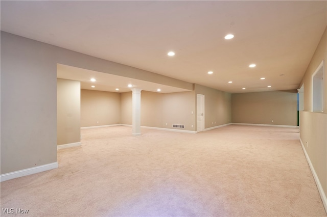 basement with light carpet