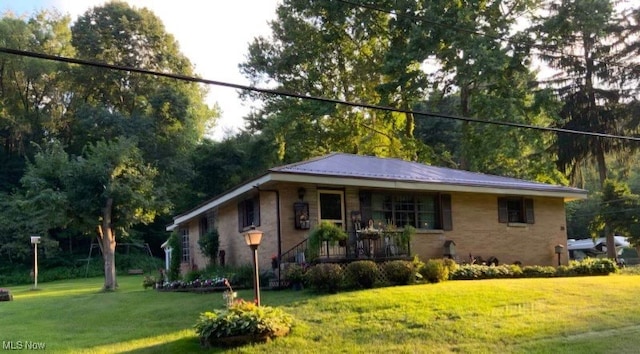 ranch-style house with a front yard