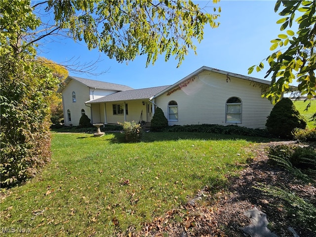 exterior space featuring a yard