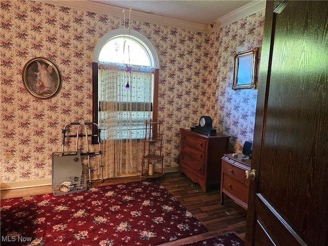 entrance foyer with ornamental molding, a textured ceiling, and dark hardwood / wood-style flooring