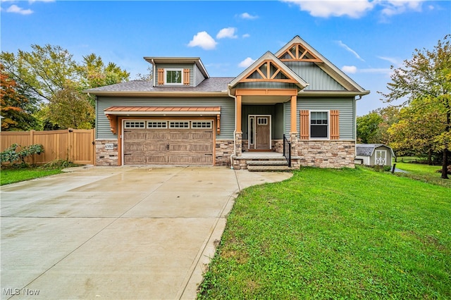 craftsman-style house with a garage and a front yard