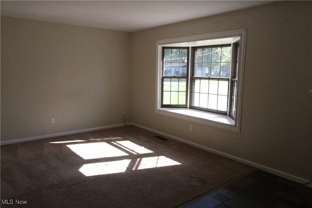 view of carpeted spare room