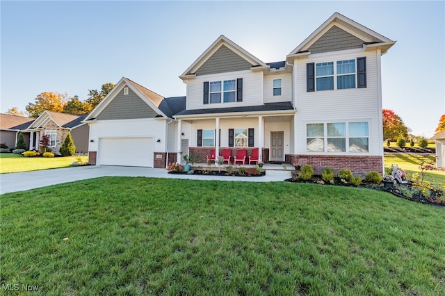 craftsman-style home featuring a porch, a front lawn, and a garage