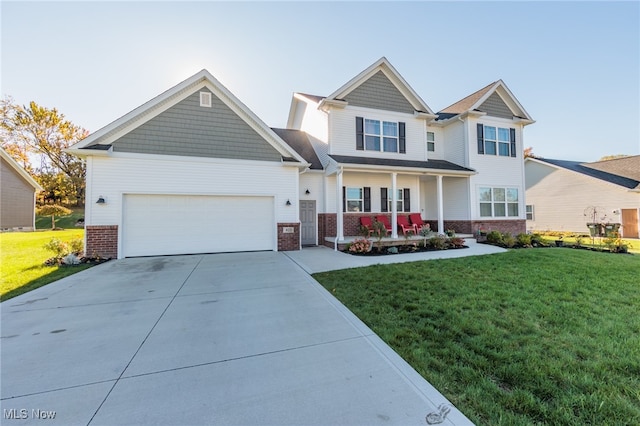 craftsman inspired home featuring a porch and a front lawn