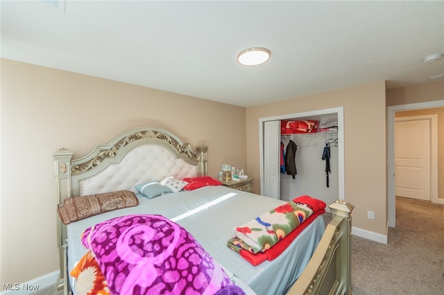 carpeted bedroom with a closet