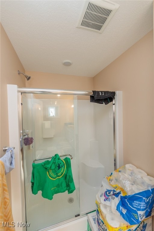 bathroom featuring walk in shower