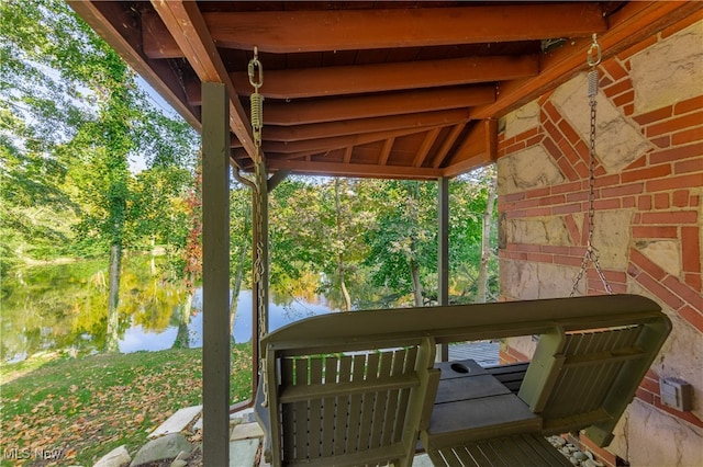 view of patio / terrace featuring a water view