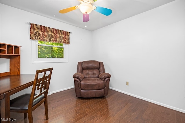 office with ceiling fan and dark hardwood / wood-style flooring