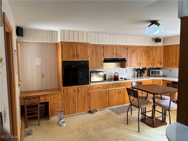 kitchen with black appliances