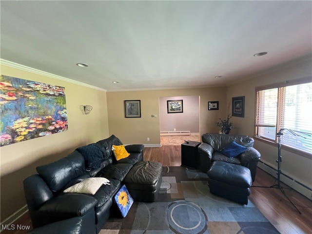 living room with crown molding, hardwood / wood-style flooring, and a baseboard heating unit