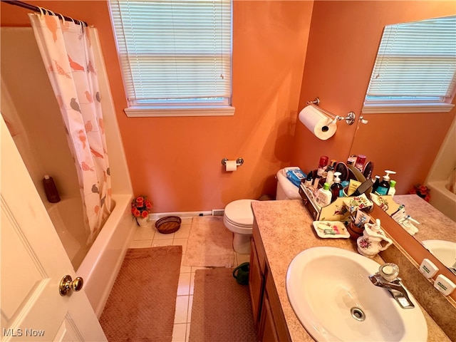 full bathroom featuring vanity, toilet, shower / bath combination with curtain, and tile patterned flooring