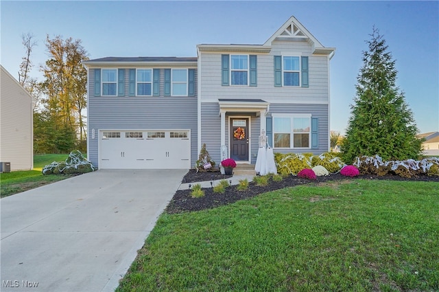 view of front of property featuring a garage, a front lawn, and central air condition unit