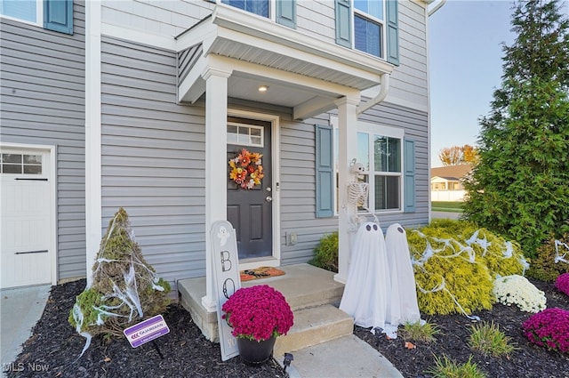 entrance to property with a garage