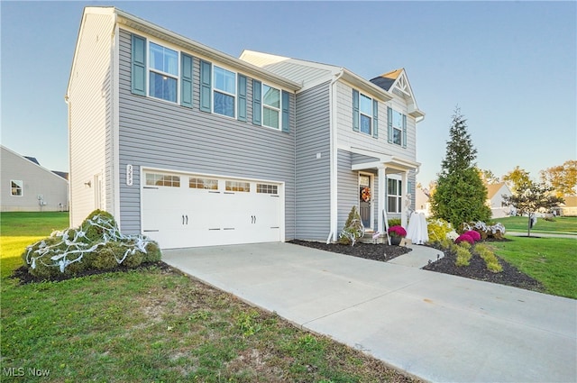 view of front facade featuring a front yard and a garage