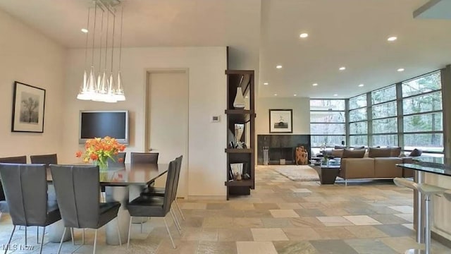 dining space with floor to ceiling windows