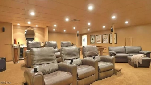 cinema room with carpet flooring and recessed lighting