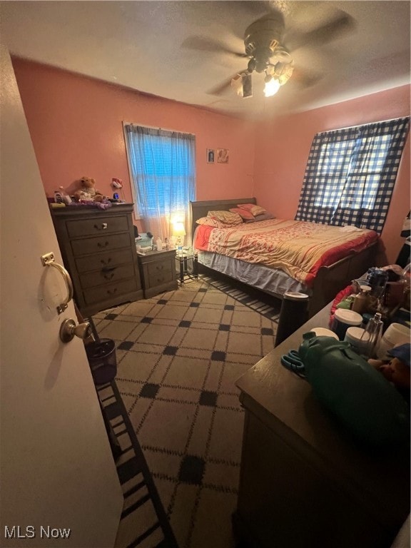 bedroom featuring ceiling fan