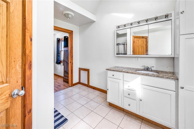 bathroom featuring vanity and tile patterned floors