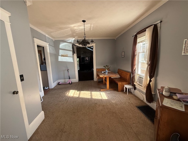 interior space featuring crown molding, cooling unit, and an inviting chandelier