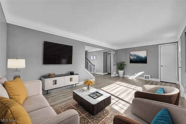 living room featuring dark hardwood / wood-style flooring