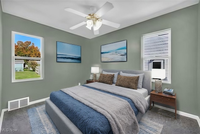 carpeted bedroom with ceiling fan