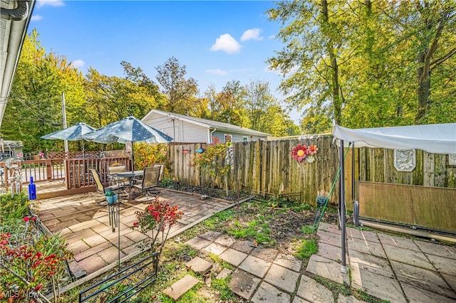 view of patio / terrace featuring a wooden deck