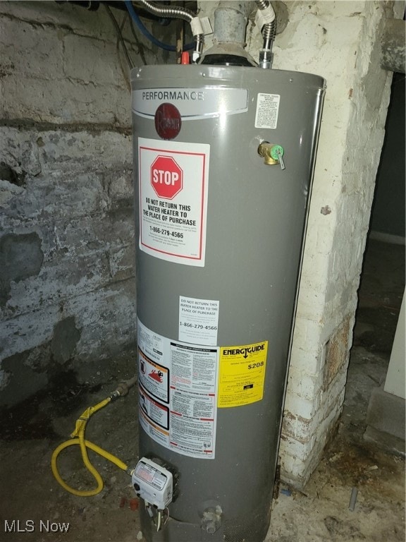 utility room with gas water heater