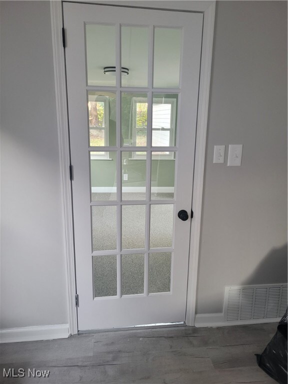 entryway featuring hardwood / wood-style flooring