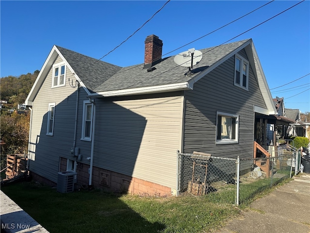 view of property exterior featuring central AC