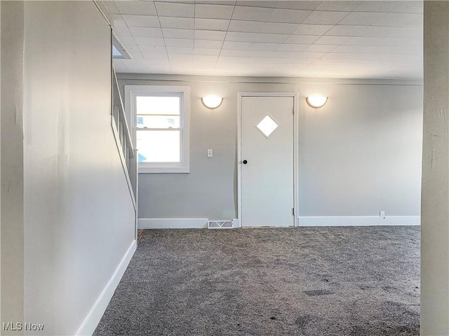 entryway with carpet floors