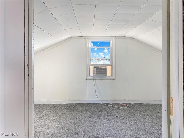 bonus room featuring carpet, cooling unit, and lofted ceiling