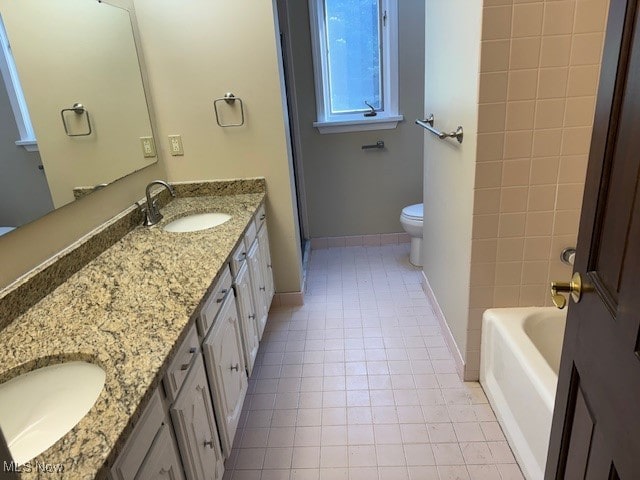 full bathroom featuring tile patterned floors, vanity, toilet, and separate shower and tub