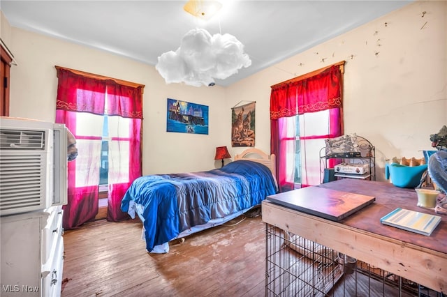 bedroom featuring hardwood / wood-style flooring