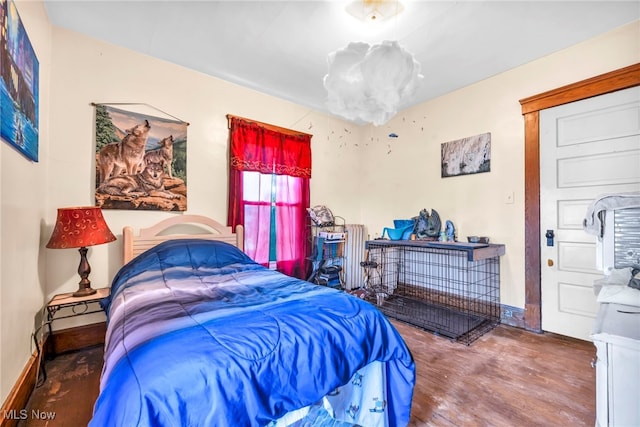 bedroom featuring hardwood / wood-style floors