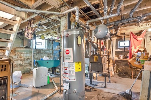 utility room featuring gas water heater