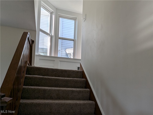 staircase featuring a healthy amount of sunlight