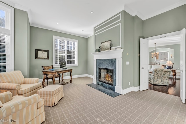 39470 Stillman Ln, Willoughby, OH 44094 - living room with a premium fireplace, ornamental molding, a healthy amount of sunlight, and hardwood / wood-style flooring