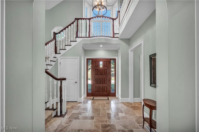 39470 Stillman Ln, Willoughby, OH 44094 - foyer entrance featuring a high ceiling and a chandelier
