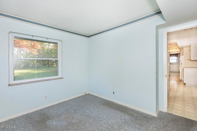 view of carpeted spare room