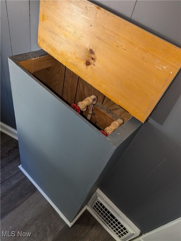 interior details featuring wood-type flooring