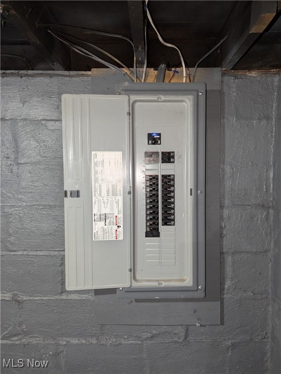 utility room featuring electric panel