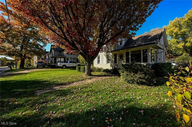 exterior space with a front yard